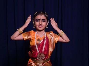Cultural event featuring traditional dance presentation